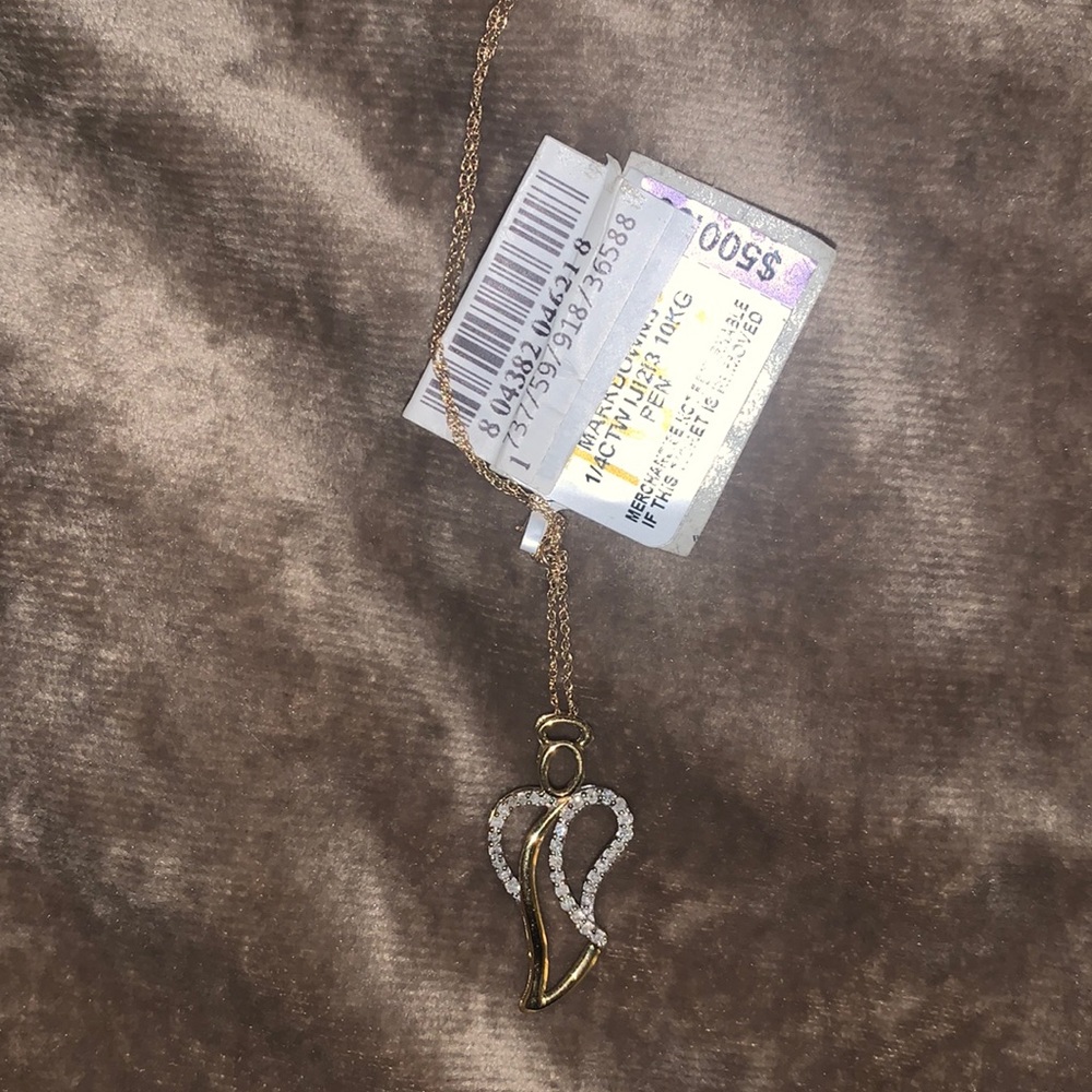 Angel diamond pendant. Gold. New with tags. Real diamond and real gold.